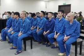 Các bị cáo tại phiên tòa. (Nguồn: báo Công an Nhân dân)
