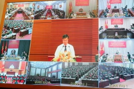 Các điểm cầu trong toàn quân dự hội nghị. (Ảnh: Trọng Đức/TTXVN)