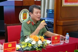 Đại tá Nguyễn Bá Tuấn, Phó Cục trưởng Cục Quản lý xuất nhập cảnh. (Ảnh: Phạm Kiên/TTXVN)