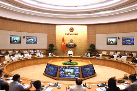 Phó Thủ tướng Trần Lưu Quang chủ trì họp Ban Chỉ đạo quốc gia về IUU. (Ảnh: Lâm Khánh/TTXVN)