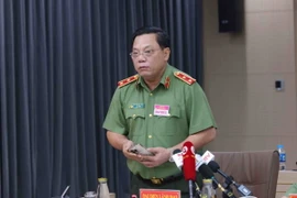 Trung tướng Nguyễn Hải Trung, Giám đốc Công an thành phố Hà Nội trả lời các câu hỏi của phóng viên các cơ quan thông tấn, báo chí. (Ảnh: Phạm Kiên/TTXVN)