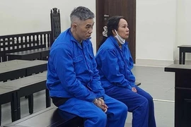 Hai đối tượng Kiều Hoàng Long và Lê Thị Bé lưu hành tiền yen Nhật giả. (Nguồn: báo Lao động)