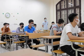 Các thí sinh được phổ biến quy chế thi (Ảnh: Hoàng Đạt/Vietnam+)