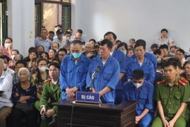 Quang cảnh phiên tòa. (Ảnh: Đinh Văn Nhiều/TTXVN)