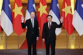 Chủ tịch Quốc hội Vương Đình Huệ và Chủ tịch Quốc hội Phần Lan Jussi Halla-aho. (Ảnh: Nhan Sáng/TTXVN)