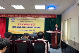 Ông Nguyễn Tiến Đông - Chủ tịch HĐTV VAMC phát biểu tại buổi khai trương. (Ảnh: CTV/Vietnam+)
