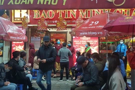 Giao dịch vàng tại Bảo Tín Minh Châu. (Ảnh: PV/Vietnam+)