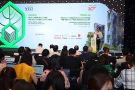 Cục trưởng Cục Quản lý nhà và thị trường bất động sản (Bộ Xây dựng) Hoàng Hải phát biểu tại tọa đàm. (Ảnh: Hùng Võ/Vietnam+)