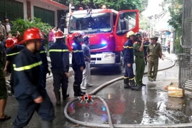 Lực lượng Cảnh sát Phòng cháy chữa cháy Cao Bằng khống chế được đám cháy sau khoảng 30 phút. (Ảnh: Quốc Đạt/TTXVN)