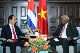 Chủ tịch nước Trần Đại Quang gặp Chủ tịch Quốc hội Cuba Esteban Lazo. (Ảnh: Nhan Sáng/TTXVN)