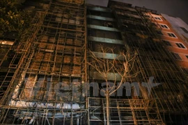 Hiện trường vụ cháy quán karaoke ở số 68- phố Trần Thái Tông ngày 1/11. (Ảnh: Minh Sơn/Vietnam+)