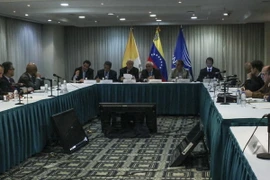 Tổng thống Venezuela Nicolas Maduro (giữa) tại Caracas ngày 30/10 vừa qua. (Ảnh: AFP/TTXVN)