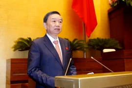 Bộ trưởng Bộ Công an Tô Lâm trình bày Tờ trình dự án Luật quản lý, sử dụng vũ khí, vật liệu nổ và công cụ hỗ trợ. (Ảnh: An Đăng/TTXVN)