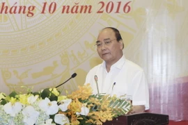 Thủ tướng Nguyễn Xuân Phúc phát biểu kết luận hội nghị. (Ảnh: Phạm Kiên/TTXVN)