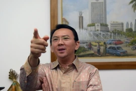 Thị trưởng thành phố Jakarta Basuki Tjahaja Purnama phát biểu trước báo giới tại thành phố Jakarta ngày 14/8/2014. (Ảnh: AFP/TTXVN)