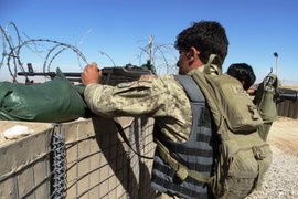 Lực lượng an ninh Afghanistan tham gia chiến dịch truy quét phiến quân Taliban tại tỉnh Helmand. (Nguồn: THX/TTXVN)