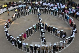 Biểu tượng nhân quyền và công lý (Ảnh minh họa: AFP/TTXVN)