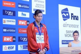 Ánh Viên không giấu nổi nỗi thất vọng với thành tích đạt được, cho dù đạt huy chương đồng nội dung 400m hỗn hợp. (Ảnh: Tiến Nhất/Vietnam+)