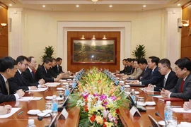 Trưởng Ban Tuyên giáo Trung ương Võ Văn Thưởng hội đàm với Trưởng Ban Tuyên truyền Trung ương Đảng Cộng Sản Trung Quốc Hoàng Khôn Minh. (Ảnh: Phương Hoa/TTXVN)