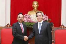 Trưởng Ban Kinh tế Trung ương Nguyễn Văn Bình tiếp Lãnh đạo tập đoàn Dell EMC do ông Anothai Wettayakorn làm trưởng đoàn. (Ảnh: Phương Hoa/TTXVN)