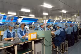 Dây chuyền sản xuất linh kiện điện tử. (Ảnh: Phạm Kiên/TTXVN)