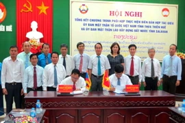 Lễ ký kết tại hội nghị. (Ảnh: Quốc Việt/TTXVN)