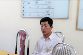 Đối tượng Hoàng Văn Bằng tại cơ quan điều tra. (Ảnh: TTXVN phát)