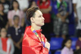 Đinh Phương Thành giành 2 HCV SEA Games 30. (Ảnh: Vietnam+)