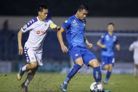Văn Quyết (áo trắng) giúp Hà Nội FC vượt qua Quảng Nam để giành Cúp Quốc gia 2019. (Nguồn: Zing)