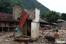 Bản Hua Nậm, xã Nặm Păm, huyện Mường La tan hoang sau mưa lũ. (Ảnh: Nguyễn Cường/TTXVN)