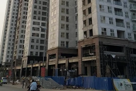 Hiện trường chung cư Newlife Tower, nơi xảy ra vụ tai nạn lao động làm 3 người tử vong. (Ảnh: Trung Nguyên/TTXVN)