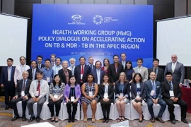 Đại biểu các nền kinh tế APEC dự đối thoại chụp ảnh chung. (Ảnh: Văn Điệp/TTXVN)