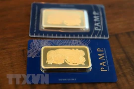 Vàng miếng được trưng bày tại Singapore. (Nguồn: AFP/TTXVN) 