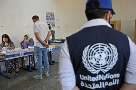 Người di tản bỏ phiếu trong cuộc bầu cử lập pháp tại điểm bầu cử ở Arbil, Iraq, ngày 8/10/2021. (Ảnh: AFP/ TTXVN)