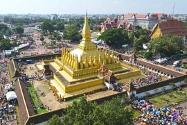 Lễ rước Phasatpheung tại chùa Thatluang ở thủ đô Vientiane, ngày 14/11/2024. (Ảnh: Đỗ Bá Thành/TTXVN) 