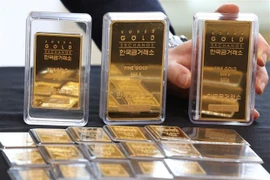 Vàng miếng được bày bán tại Sàn giao dịch vàng ở Seoul, Hàn Quốc. (Ảnh: Yonhap/TTXVN) 