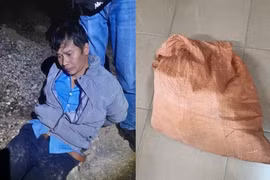Lù A Mình và tang vật vụ án.(Nguồn: Báo Thanh Niên)