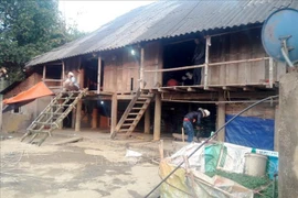 Ngôi nhà xảy ra vụ thảm án tại bản Co Phày, xã Mường Cang, huyện Than Uyên (Lai Châu). (Ảnh: TTXVN phát) 