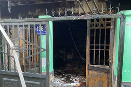 Căn nhà bị cháy. (Ảnh: TTXVN)