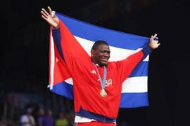 VĐV Mijain Lopez Nunez của Cuba giành huy chương Vàng nội dung vật Hy Lạp - La Mã hạng cân 130kg nam tại Olympic Paris 2024. (Ảnh: Getty Images/TTXVN)