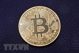 Đồng tiền kỹ thuật số Bitcoin. (Nguồn: AFP/TTXVN) 
