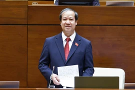 Bộ trưởng Bộ Giáo dục và Đào tạo Nguyễn Kim Sơn giải trình, làm rõ một số vấn đề đại biểu Quốc hội nêu. (Ảnh: Doãn Tấn/TTXVN)