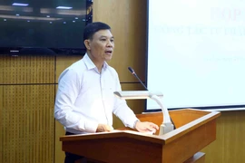 Chánh Văn phòng, Người phát ngôn Bộ Tư pháp Nguyễn Quốc Hoàn thông báo tới các cơ quan thông tấn, báo chí về công tác tư pháp quý 3 năm 2022. (Ảnh: Phạm Kiên/TTXVN)