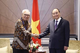 Chủ tịch nước Nguyễn Xuân Phúc tiếp Chủ tịch Hội Hữu nghị Indonesia - Việt Nam Budiarsa Sastrawinata. (Ảnh: Thống Nhất/TTXVN)
