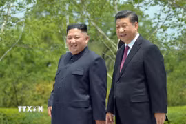 Tổng Bí thư, Chủ tịch Trung Quốc Tập Cận Bình và nhà lãnh đạo Triều Tiên Kim Jong Un. (Nguồn: TTXVN)