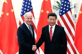 Chủ tịch Trung Quốc Tập Cận Bình và ông Joe Biden tại cuộc gặp ở Bắc Kinh, Trung Quốc tháng 12/2013. (Nguồn: Getty Images)