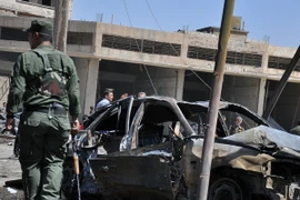 Hiện trường vụ đánh bom tại quận al-Antariyeh của thành phố Qamishli, miền Bắc Syria. (Nguồn: AFP/TTXVN)