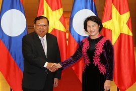 Chủ tịch Quốc hội Nguyễn Thị Kim Ngân hội kiến Tổng Bí thư Đảng Nhân dân Cách mạng Lào, Chủ tịch nước CHDCND Lào Bounnhang Volachith. (Ảnh: Trọng Đức/TTXVN)