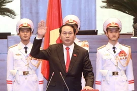 Chủ tịch nước Trần Đại Quang tuyên thệ nhậm chức. (Ảnh: Nhan Sáng/TTXVN)