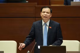Bộ trưởng Bộ Nông nghiệp và Phát triển Nông thôn Nguyễn Xuân Cường trả lời chất vấn. (Ảnh: Doãn Tấn - TTXVN)